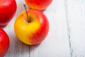 apple fruits on old white wooden table