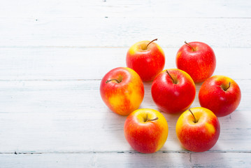 apple fruits on old white wooden table