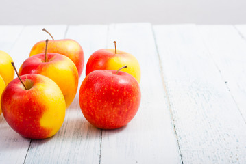 apple fruits on old white wooden table