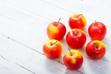 apple fruits on old white wooden table