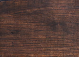 Texture of black walnut board with oil finish