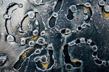 Gold metal vintage textured background with black forged pattern. Metal lace. Background