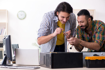 IT engineers working on hardware issue