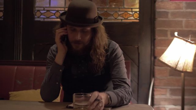 police detective receives a phone call and left the office