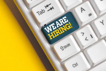 Conceptual hand writing showing We Are Hiring. Concept meaning recently you employ someone or pay...