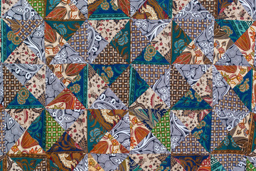 Detail patchwork quilt in street market. Bali island, Ubud, Indonesia. Closeup patchwork blanket texture
