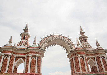 The arch is brick. Arch of brick.