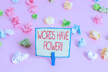 Text sign showing Words Have Power. Business photo text as they has ability to help heal hurt or harm someone Colored crumpled papers empty reminder pink floor background clothespin