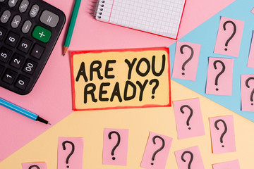 Text sign showing Are You Ready Question. Business photo text used telling someone start something when feel prepared Mathematics stuff and writing equipment above pastel colours background