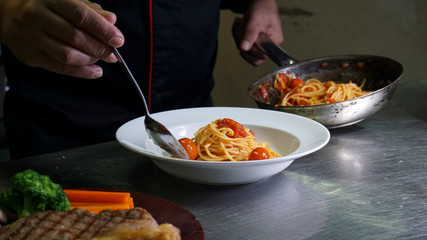 chef plating spaghetti