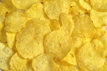 crispy potato chips snack texture, food background, close-up