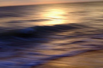 sunset over the sea,wave,motion,reflection,nature,summer,light,sunrise,sunlight