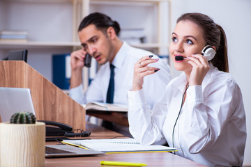 Call center operators working in the office