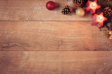 Christmas Background With Red Candles, Golden Cones And Sparkle Balls. Top View, Flat Lay. Winter Holidays Wooden Backdrop With Copy Space For Text