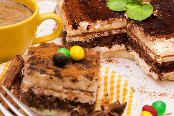 Tiramisu dish with cinnamon and candies