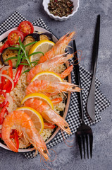 Unpeeled boiled shrimp with bulgur