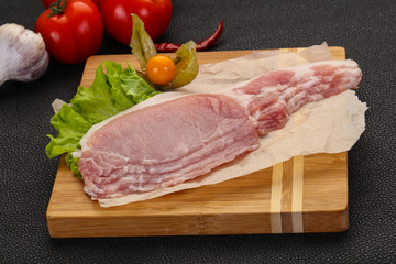 Raw pork bacon