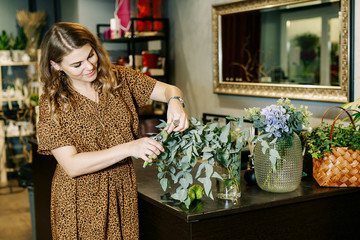 Florist collects a beautiful bouquet