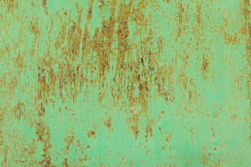 rusty metal surface with blue paint flaking and cracking texture