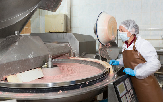 Female controlling making of meat batter