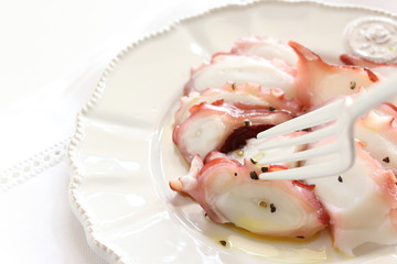 Boiled octopus and pepper olive oil for gourmet appetizer