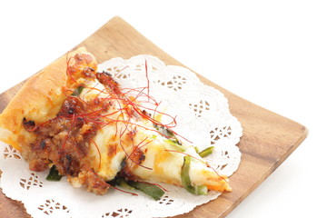 Fusion pizza, beef and leek with chili pepper  Asian taste