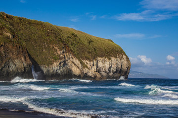 Areal de Santa Barbara - a pretty black sand beach on the north coast of Sao Miguel Island, Azores,...