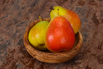 Pear heap in the wooden basket