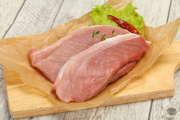 Juicy raw pork steak meat