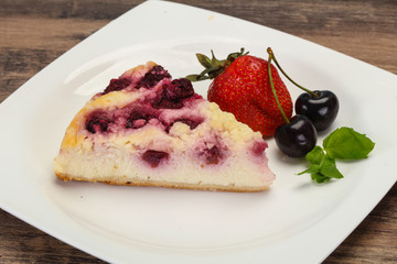 Cheesecake with cherry served strawberry