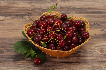 Sweet ripe cherry with leaves