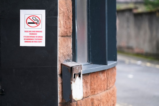 No Smoking Sign And Metal Ash Tray Outside Pub In UK