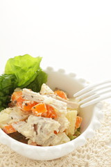 Chicken and potato salad with carrot mayonnaise salad