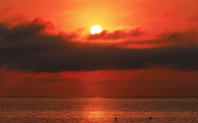 Sunrise over the sea and beautiful cloudscape. Meditation ocean and sky background. 