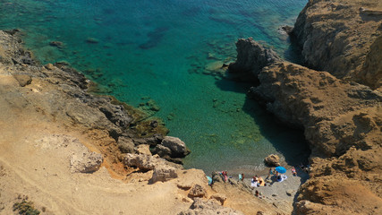 Aerial drone photo of emerald secluded crystal clear sea rocky cove of Ble limanaki or Blue Harbour in famous island of Astypalaia, Dodecanese, Greece