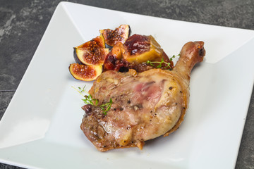 Roasted. duck. leg with plum and apple