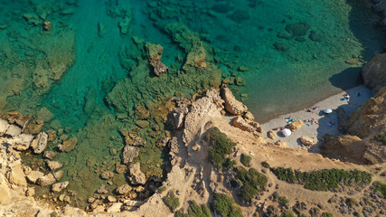 Aerial drone photo of emerald crystal clear sea rocky beach of Plakes in famous island of Astypalaia, Dodecanese, Greece