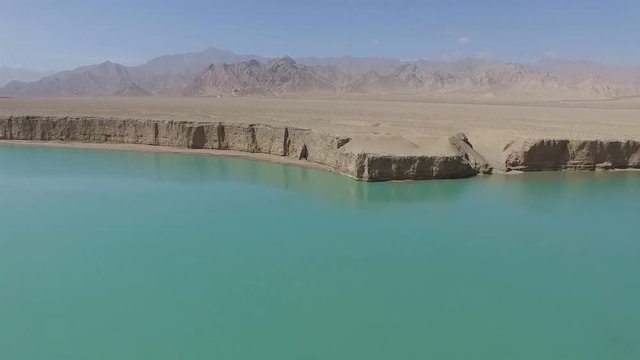 Aerial view of the Amu Darya River in Afghanistan. The Amu Darya is a large river in Central Asia, carrying water to the Aral Sea.
