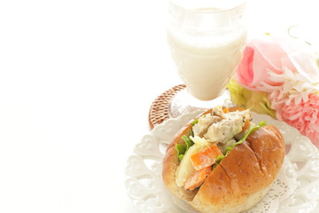Chicken and potato mayonnaise salad in bun sandwich