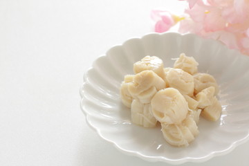 Canned food, boiled scallop in dish with copy space