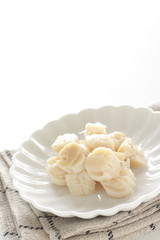 Canned food, boiled scallop in dish with copy space