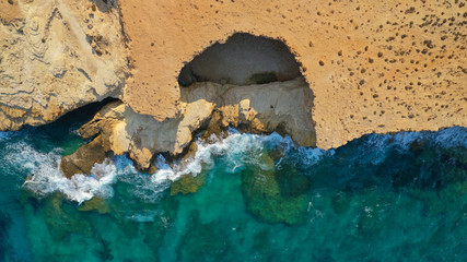 Aerial drone photo of volcanic formations of Gala rocky seascape in Pano Koufonisi island, Small Cyclades, Greece