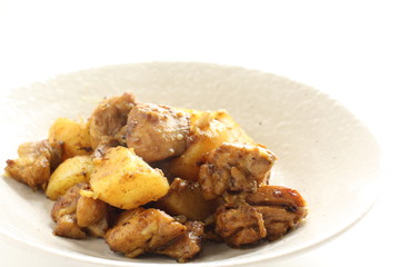 Potato and chicken stir fried with curry 