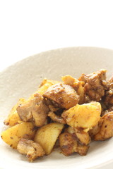 Potato and chicken stir fried with curry 
