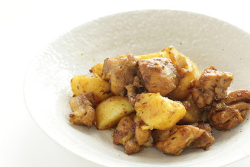 Potato and chicken stir fried with curry 