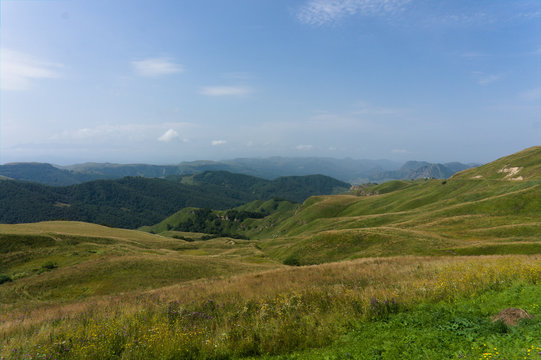 Lush green lawns meadows and mountains above 2000 m on the gumbashi pass in the northern caucasus between dombay and kislowodsk, raw original picture