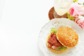 Fototapeta na wymiar Pan fried luncheon meat and sausage in sesame bun for sandwich breakfast