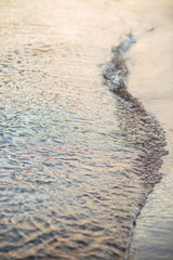 Sea wave close up, low angle view, sunrsie shot