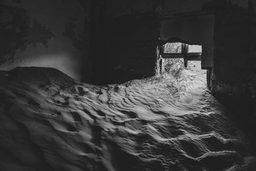 abandoned house full of sand 