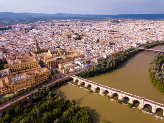 Obraz premium Cordoba with Roman Bridge over the Guadalquivir and the Mosque-Cathedral
